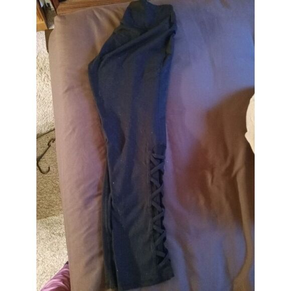 TORRID Activewear Leggings.  Criss-cross design adds a special touch. - Picture 1 of 6